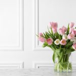 Beautiful,Bouquet,Of,Tulips,In,Glass,Vase,On,White,Marble