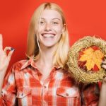 Smiling,Woman,With,Autumn,Wreath,Shows,Ok.,Happy,Girl,In
