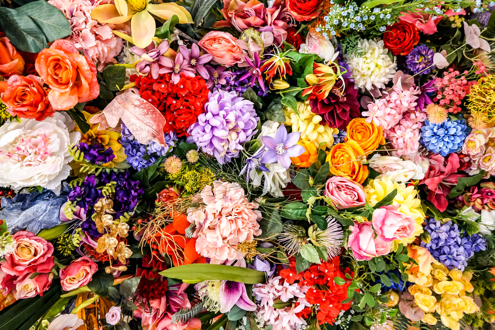 Mixed,colorful,flowers,background.,vibrant,colors,of,mixed,flowers,backdrop