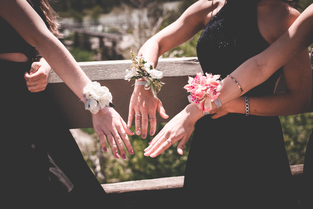 Beautiful,image,of,girls,showing,their,floral,corsages.