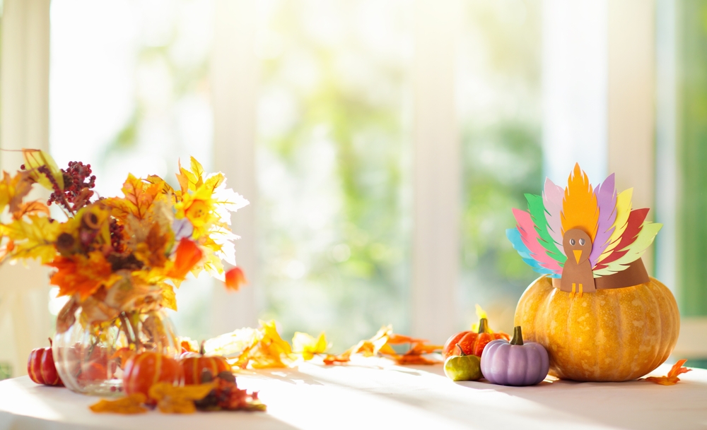 Thanksgiving,home,decoration.,turkey,arts,and,crafts,hat,on,pumpkin.